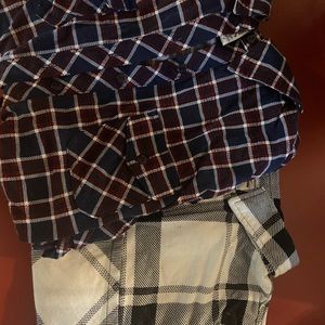 Two pairs of long sleeve plaid t-shirts